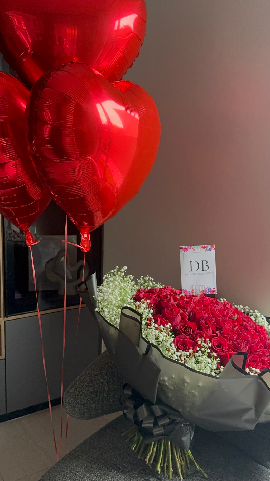 80 Red Roses with Baby’s Breath & 3 Heart Balloons
